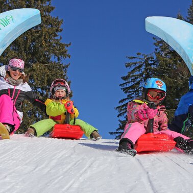 Zipfelbobfahren mit der ganzen Familie. | © Hans-Peter Steiner