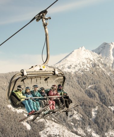 Family on a chair lift in Schladming