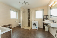 Bathroom with bath tub and shower