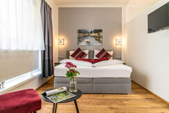 Schlafzimmer im Apartment Greisslerei