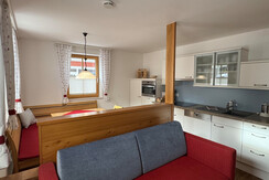 Bergwasser Wohnküche mit ausziehbarem Sofa