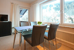 Dining table and access to the balcony top 2