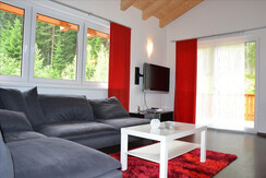 Sofalandschaft mit Flat-TV