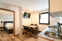 Club House Top 1 - Open kitchen and living area