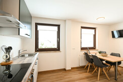 Club House Top 3 - Open living & kitchen area