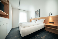 Bedroom with box spring bed