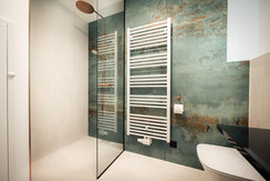 Bathroom with rain shower and washbasin
