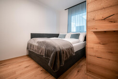 Second bedroom with comfortable boxspringbed