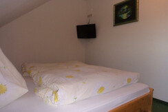 Schlafzimmer mit Fernseher
