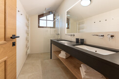Bathroom with shower and basin