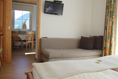 Familienzimmer mit Küchenblock