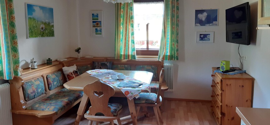 Die gemütliche Sitzecke in der Wohnküche im 1. Sto | © Ferienhaus Tschernitz