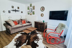 Sofa with rocking chair and TV 2