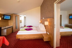 Schlafzimmer mit Sitzecke