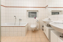 Top 2 bathroom 1 with bath tub and double wash basin