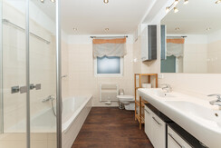 Bathroom with shower and bath tub