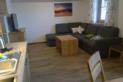 Wohnbereich mit ausziehbarem Sofa