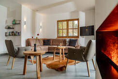 Comfortable couch with panorama glass front