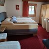 Photo of double bed room with shower, WC