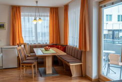 Dining table and access to the balcony