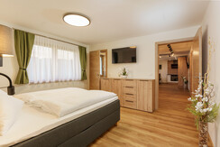 Bedroom with passage to the bathroom