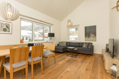 Eat-in kitchen with dining table and sofa