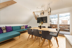 Eat-in kitchen with sofa and dining table