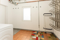 Ski storage room with ski boot dryer & washing machine