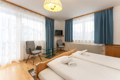 Bedroom 2 with tv and seating