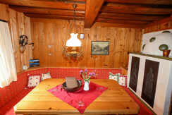 Anno1902 - Parlour with dining table and sofa